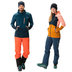 Mann und Frau mit Wintersportkleidung