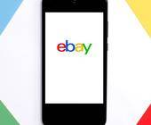 Handy mit ebay-Logo
