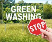 Schriftzug Greenwashing mit Stoppschild davor